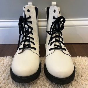 Combat boots that have only been worn once.